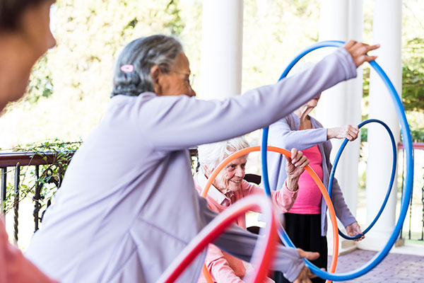 Photo of a senior woman at a fitness class at retirement home